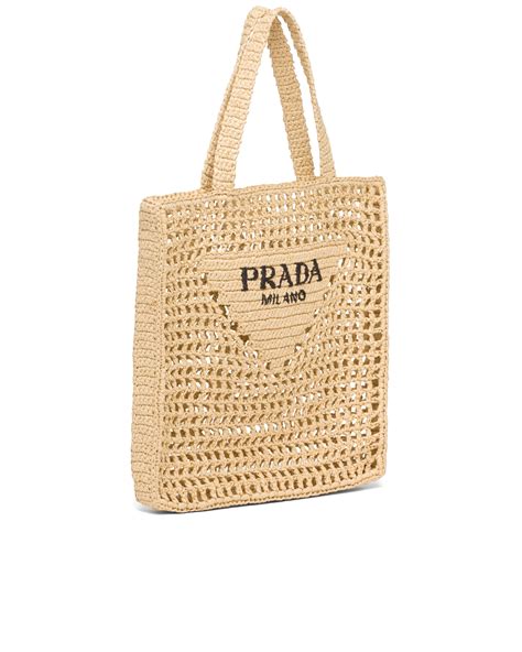 prada raffia tote bag.